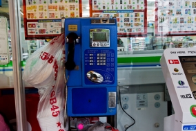 Public Phones in Bangkok, an enddangered Species